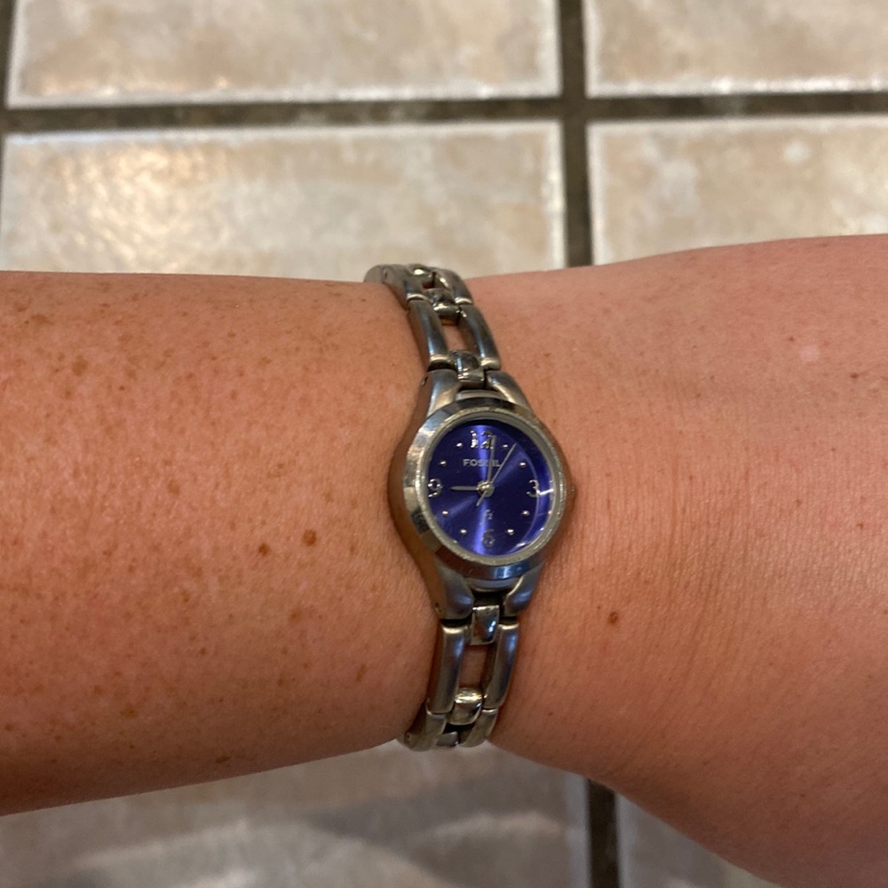 Silver fossil watch with blue face